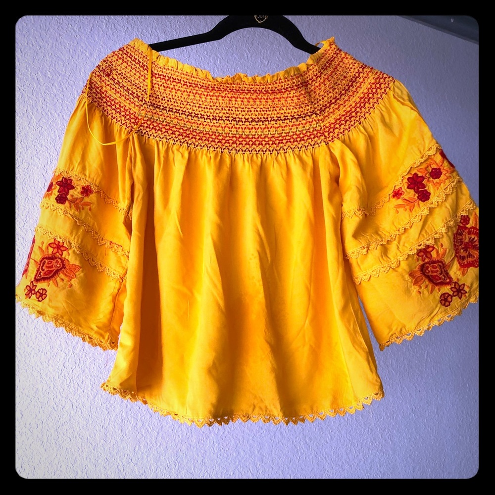Jerri’s closet. Yellow off the shoulder top.